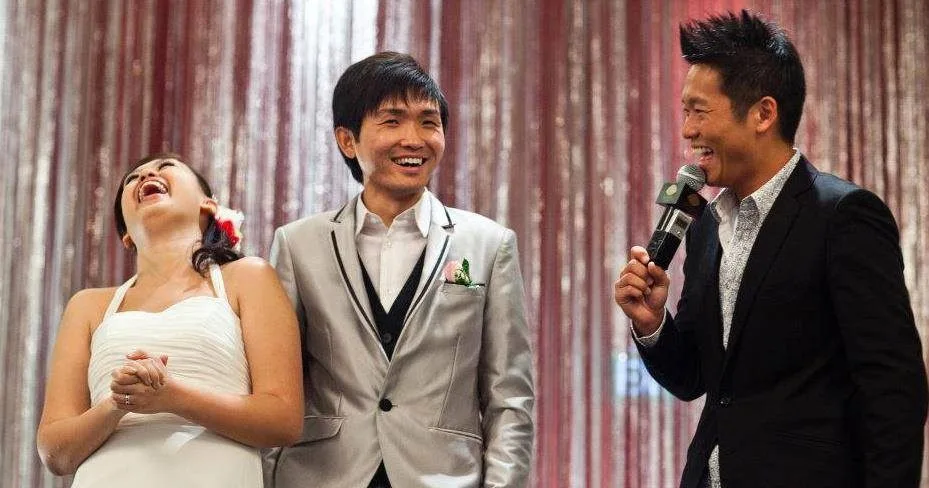 James Yang sharing a laugh with the bride and groom
