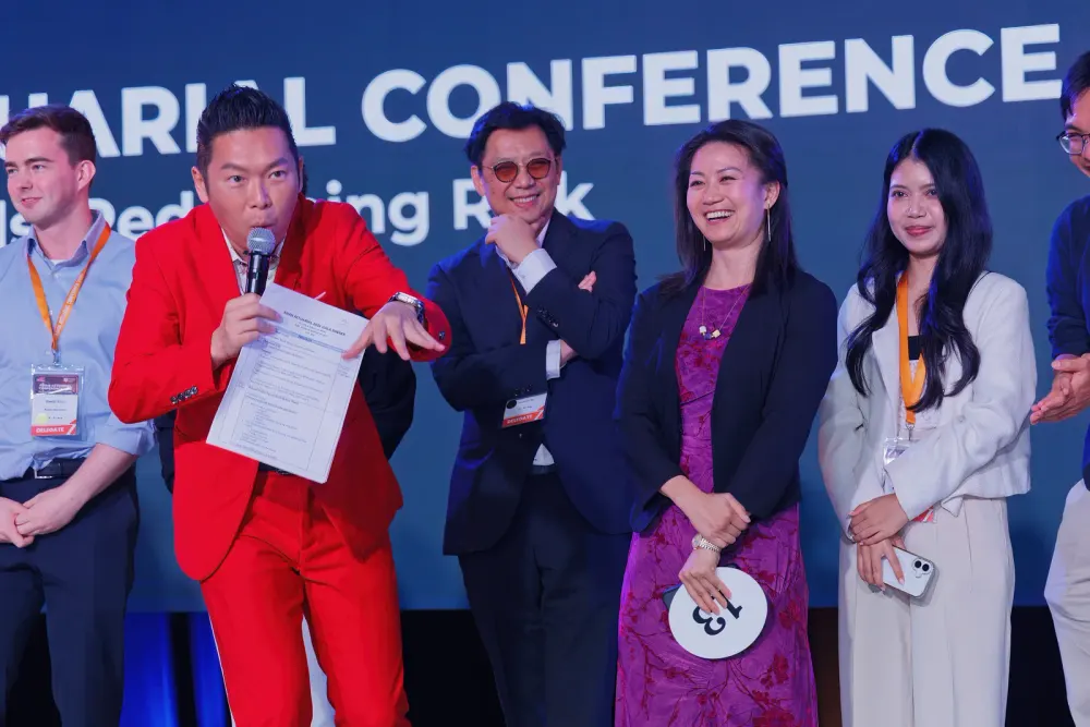 Award presentation on stage at the SAS 50th Anniversary Gala Dinner, Asian Actuarial Conference 2026